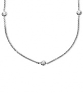 Delicate design with a touch of sparkle. Arabella's pretty necklace is set in sterling silver with eleven round-cut Swarovski zirconia stations (4-9/10 ct. t.w.). Approximate length: 36 inches.