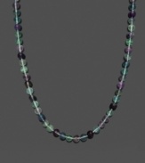 A fresh mix of spring color. Necklace features green and purple fluorite beads (8-9 mm) with a 14k gold clasp. Approximate length: 18 inches.