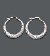 Looking for style to last a lifetime? You can never go wrong with a simple pair of hoops. Giani Bernini earrings highlight a scalloped edge in sterling silver. Approximate diameter: 1 inch.