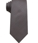 With a natty throwback pattern, this houndstooth skinny tie from Bar III is instantly dapper.