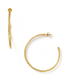 Alexis Bittar's simple textured hoops are the perfect accent to your look, day or night.