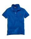 Rendered in lightweight, breathable cotton mesh, this classic polo features the requisite embroidered pony at the chest.