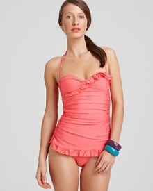 This Ella Moss skirted swimsuit flatters with a sweet retro fit and ruched and ruffled design.