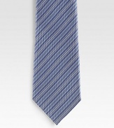 An elegant look handmade with diagonal stripes in fine Italian silk. Silk Dry clean Made in Italy 