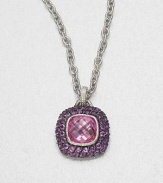 A cushion-cut pink corundum stone surrounded by pavé amethyst stones set in textured sterling silver on a link chain. Pink corundum and amethystSterling silverLength, about 17Pendant size, about 1Lobster clasp closureImported 