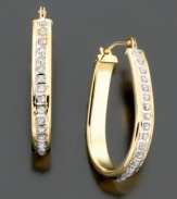 The perfect timeless accessory. 14k gold pear-shaped hoops with diamond accents for a touch of elegant sparkle.