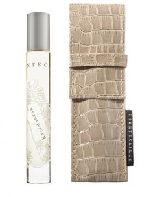 Chantecaille's beautiful signature scents now have convenience and portability. The elegant, silk-screened 0.26 oz. glass tube arrives in a khaki faux-croc pouch. Kalimantan is the ultimate sexy, exotic fragrance. Born from a trip to Borneo, it evokes the wild exotic forest, the brilliant silks, passion and charisma. 0.26 oz.