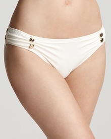 Be a mix master in Juicy Couture's solid white bikini bottom. Designed to anchor your splashiest tops, this versatile style is perfect to pack and play poolside.