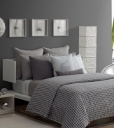 The Ombrone pattern from Lacoste features a shadowed grid print in stark grey, giving a new definition to multi-dimensional bedding. Combine this modern design with signature quilted accents and pure white sheeting for a truly luxe look.