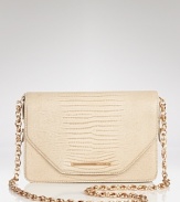 Rachel Zoe's lizard-embossed shoulder bag is a major take on the mini trend. With a removable strap, this bag does double-duty tucked under your arm an ultra-glam clutch.