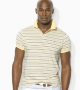 Designed for a comfortable, classic fit from breathable cotton jersey, a handsome short-sleeved polo shirt is finished with a preppy striped pattern (Clearance)