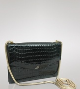 Take after hours into exotic overdrive with Tusk's croc-embossed clutch. The chain-clad compact shines all night, so pair it with a cocktail frock and booties for lasting soirée chic.