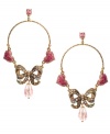 Make every day Valentine's Day! Betsey Johnson's sparkling gypsy hoops feature crystal-encrusted bows and pink crystal hearts. Crafted in gold tone mixed metal. Approximate drop: 3-1/3 inches. Approximate diameter: 1-9/10 inches.