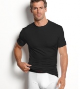 Moves with you. With a cotton and spandex blend, these Alfani T shirts are made for the guy on the go.