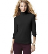 A turtleneck is an indispensable asset for any closet. INC's fitted version looks great alone or layered!