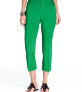 A clean, wide waistband and welt pockets give INC's petite cropped pants sleek minimalist appeal.