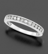 Round-cut channel-set diamonds (1/5 ct. t.w.) are the epitome of classic luxury. Diamond ring set in 14k white gold.