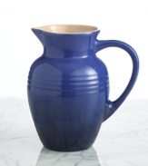 Keep the chill of your drinks longer with a stain- and absorption-resistant stoneware pitcher that is the ideal companion for wines and acidic drinks, offering a wide pouring spout and oversized handle for an effortless pour that allows fruit and ice to pass through unhindered. Limited lifetime warranty.