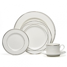 Vows creamer by Lauren by Ralph Lauren Home. Inspired by graceful curves of wedding rings, this elegant dinnerware line features interconnected platinum bands on the finest bone china. Makes a stunning table for any special occasion.