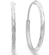 A must-have accessory for every collection. Giani Bernini's sterling silver hoop earrings feature a unique textured design. Approximate diameter: 3/4 inch.