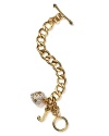 Juicy's starter charm bracelet gets the party started with a thick goldtone chain with crystal pavé heart and J charms.