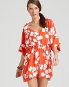 Brighten up your basic beach look with a floral print coverup from DIANE von FURSTENBERG. The draped styling and short silhouette is as alluring as your favorite sundress.