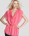 Utterly feminine, Sweet Pea's pretty-in-pink top gets sophisticated with soft draping and a cinched waist.