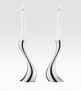 German designer Constantin Wortmann's curvaceous candlesticks are aptly named as they undulate elegantly into serpentine arcs.From the Cobra Collection Fits standard taper candles Candle not included 7¾H Stainless steel Dishwasher safe Imported