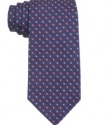 A subtle pattern gives way to standout style. Keep it fresh with this DKNY silk tie.