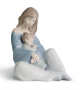 Set in pure porcelain and painted with soothing pastels, this glazed figurine captures pure serenity and love between a mother and her little one. Makes the perfect gift for any mother.