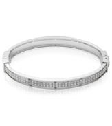 Shimmering and stylish. Fossil's bangle bracelet is crafted from silver-tone stainless steel with sparkling accents providing a lustrous touch. Approximate diameter: 2-5/8 inches.