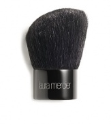 A black goat hair, kabuki-style brush with severely rounded edges and a gently cut angled head allowing for fuller coverage on the planes of the face. Ideally used with the Mineral Powder SPF 15 as well as other powder formulations. Pick up powder on the slanted face, tap off excess and buff into the skin. 