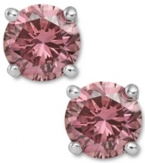 Perfection in pink. These sparkling stud earrings feature round-cut pink diamonds (2 ct. t.w.) in a four-prong setting of 14k white gold. Approximate diameter: 1/3 inch.