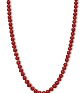 Crimson chic. This brilliantly-hued strand necklace features bold red agate beads (150 ct. t.w.) in a polished 14k gold setting. Approximate length: 18 inches. Approximate bead diameter: 7 mm.