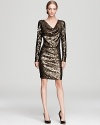 Up your cocktail cachet in this MICHAEL Michael Kors dress, flaunting a cascade of decadent sequins for a fluid, fearless silhouette.