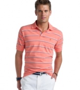 Fine lines. With a sophisticated polish, this Izod polo shirt is sure to become a favorite in your casual wardrobe.