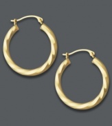 Put a positive spin on it. Traditional hoops take on a sweet, new look with a subtle twisted design in polished 18k gold. Approximate diameter: 3/4 inch.