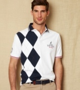 Hit the links in style with this argyle polo shirt from Nautica.