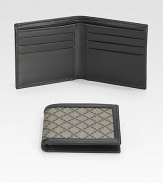 A classic wallet in signature diamante-plus fabric with leather trim and interior. Two bill compartments Six card slots 4.3W X 3.8H Made in Italy 