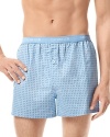 Woven cotton provides comfort to these handsome boxers outfitted with a slim silhouette to maintain your modern look.