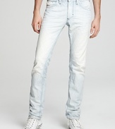 Slim fit jeans in faded railroad stripes with light distressing.