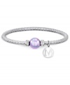 Shine bright with this bracelet from Majorica. Crafted from rhodium-plated stainless steel, the bracelet features organic man-made pearl and cubic zirconia accents (1/2 ct. t.w.) to sparkling effect. Approximate length: 7 inches.