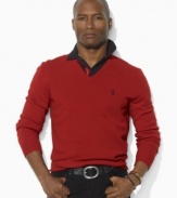 A classic V-neck sweater is crafted from luxe Italian wool, making it the perfect preppy layering piece as the temperature begins to cool.