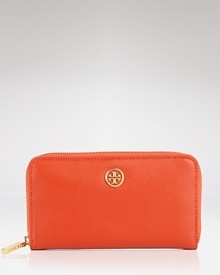 Loved for it's polished look, Tory Burch's zip around wallet is an ever-chic essential. With eight credit card pockets and an interior zip pocket, this latest piece from the NYC label offers the substance to match the style.