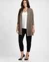 Lightweight linen makes this the idyllic layering piece. Pair this open-front cardigan with your favorite pants or jeans for a effortlessly elegant look.Open-front designThree-quarter sleevesSide slitsAbout 29 from shoulder to hemLinenDry cleanImported