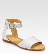 A chic, comfortable leather design with a sturdy ankle strap. Leather upperAdjustable ankle strapLeather liningRubber solePadded insoleImportedOUR FIT MODEL RECOMMENDS ordering true size. 