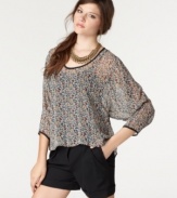 Back keyhole cutouts & an asymmetrical hi-lo hem ups the edge on this sheer floral-printed Bar III top -- a hot layering piece!