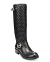 VINCE CAMUTO takes the moto trend into tall, chic, ladylike boots that are polished enough for the officeplace thanks to gold hardware and quilted shafts.