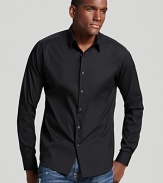 This handsome slim fit sport shirt is crafted with a touch of stretch, for an extra sleek silhouette.