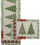 Enjoy every moment with Holiday Memories placemats from Windham Weavers. Graphic trees bordered by snowflakes, holly and holiday stripes create a tapestry of Christmas cheer for casual tables.